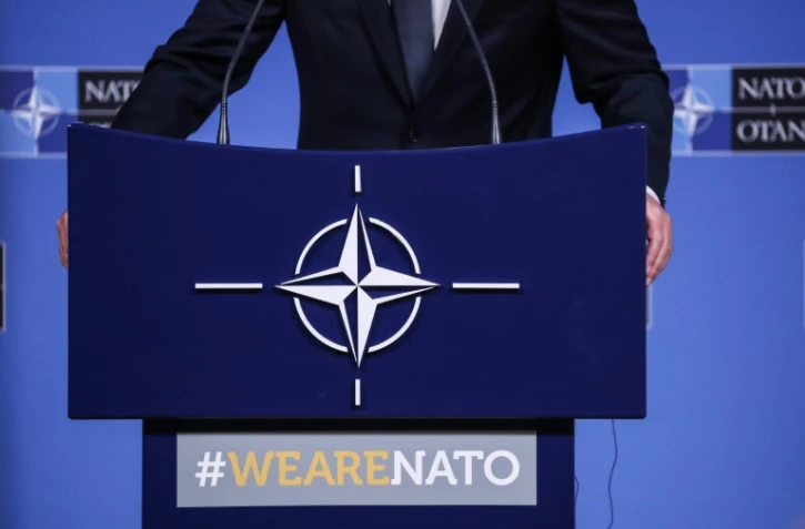 Le logo de l'OTAN sur le pupitre du secrétaire général Jens Stoltenberg, lors d'une conférence de presse le 23 octobre 2019 à Bruxelles