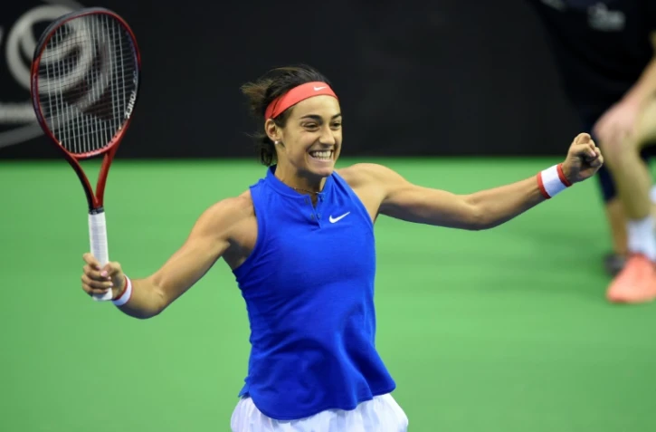 La Française Caroline Garcia exulte après avoir remporté son simple face à la Belge Alison Van Uytvanck en Fed Cup, le 9 février 2019 à Liège
