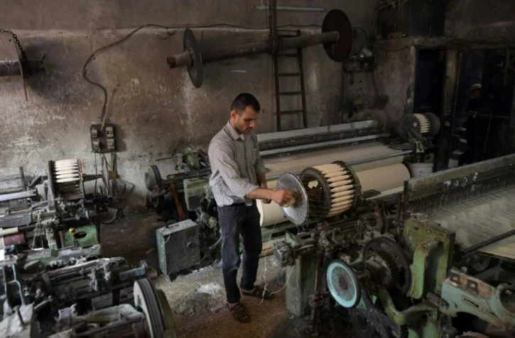 Mahmoud Makini dans son atelier du quartier industriel de Karm al-Katerji, à Alep, le 30 août 2021 en Syrie