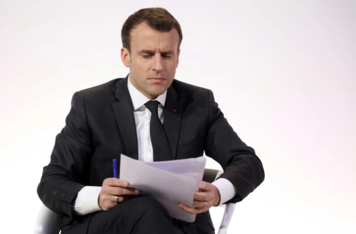Emmanuel Macron présente jeudi à Paris, un plan ambitieux pour développer l'intelligence artificielle, cette nouvelle technologie en passe de révolutionner l'économie et la société, le 27 mars 2018.