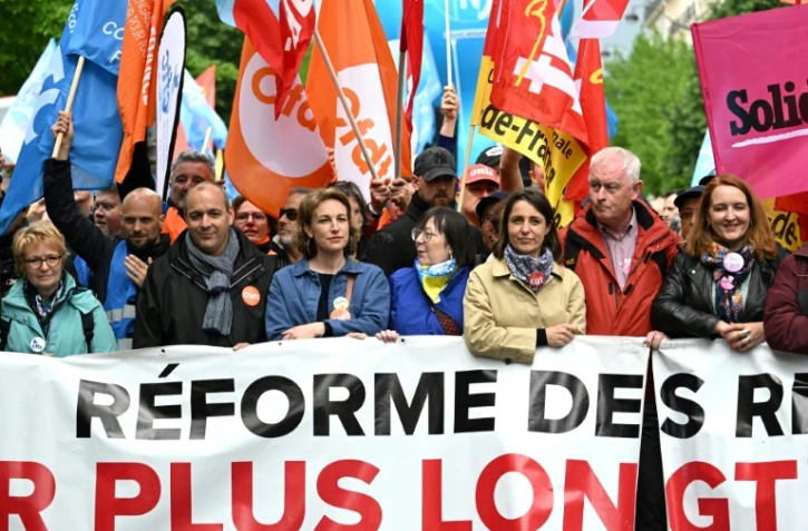 Des leaders syndicaux lors de la 13e journée de mobilisation contre la réforme des retraites à Paris le 1er mai 2023