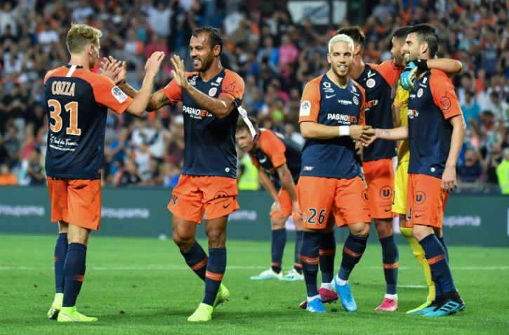 Les joueurs de Montpellier fêtent leur victoire à domicile sur Lyon 1-0 en match décalé de la 3e journée de L1 le 27 août 2019