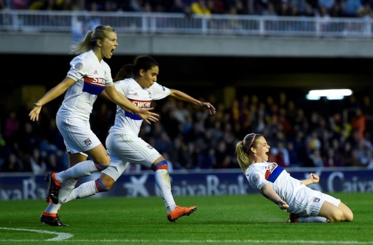 La joie des Lyonnaises après un but d'Eugénie Le Sommer (d) face au FC Barcelone en Ligue des champions, le 28 mars 2018, en Catalogne