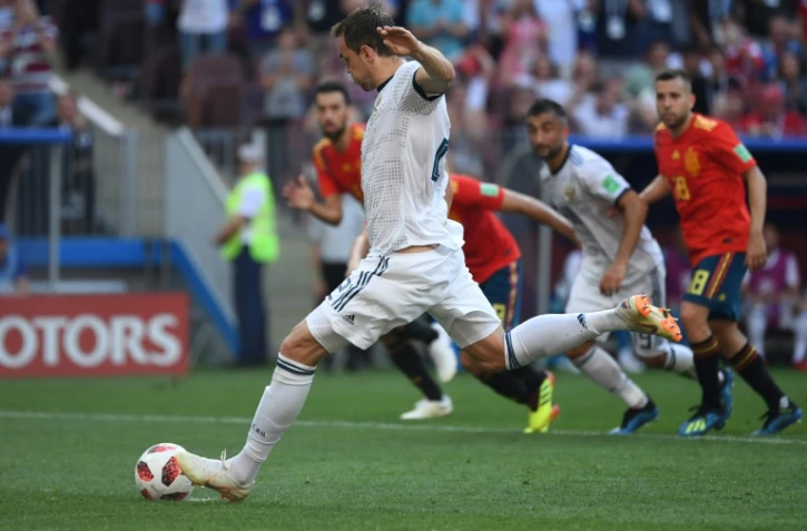 L'attaquant russe Artem Dzyuba égalise sur penalty contre l'Espagne en 8e de finale du Mondial, le 1er juil 2018 à Moscou