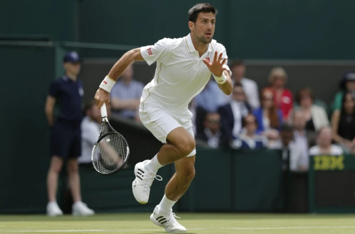 Le numéro 1 mondial Novak Djokovic (ici à Wimbledon le 27 juin 2016) tentera de rebondir après son élimination surprise au 3e tour du tournoi londonien