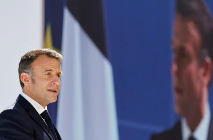 Le président français Emmanuel Macron prononce un discours lors de la cérémonie d'inauguration du centre de formation et d'innovation TANGRAM à Marseille, dans le sud de la France, le 8 mai 2024