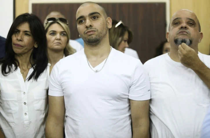 Elor Azaria, un soldat israélien (C) dans une cour militaire de Tel Aviv le 30 juillet 2017