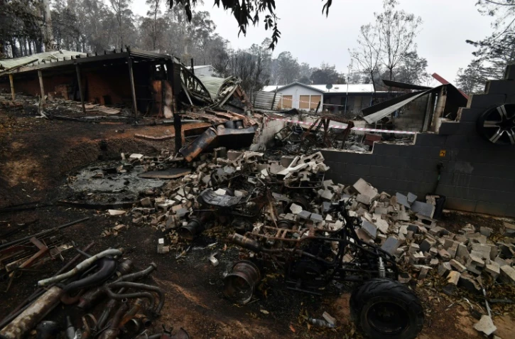 Maisons détruites par un incendie, dans le village de Mogo (sud de l'Australie), le 6 janvier 2020