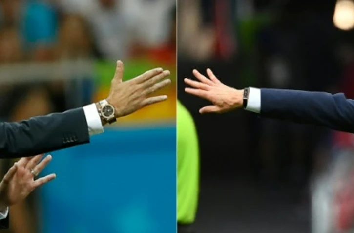 Les sélectionneurs de la Belgique et de la France, Roberto Martinez (g) le 2 juillet lors d'un 8e face au Japon à Rostov-sur-le-Don, et Didier Deschamps le 30 juin lors d'un 8e face à l'Argentine à Kazan