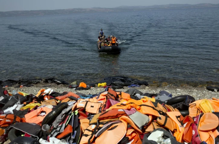 Des migrants arrivent sur l'île grecque de Lesbos, après avoir traversé la mer Egée depuis la Turquie, le 10 septembre 2015