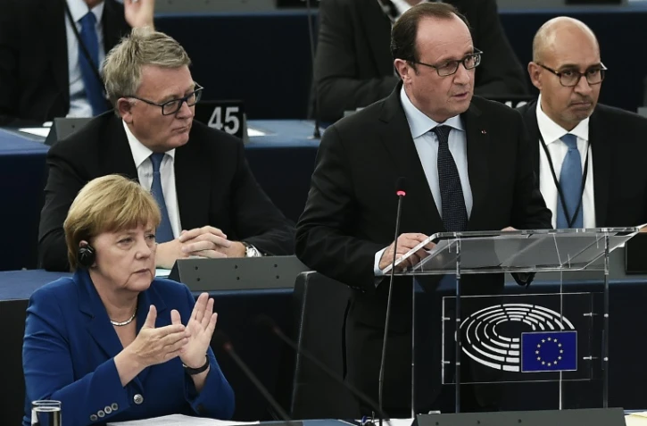 Le président français François Hollande et la Chancelière allemande Angela Merkel, au Parlement européen, le 7 octobre 2015 à Strasbourg