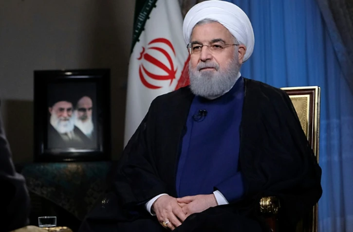 Une photo fournie par la présidence iranienne montre le président Hassan Rohani donnant une interview le 6 août 2018 à la télévision iranienne à Téhéran