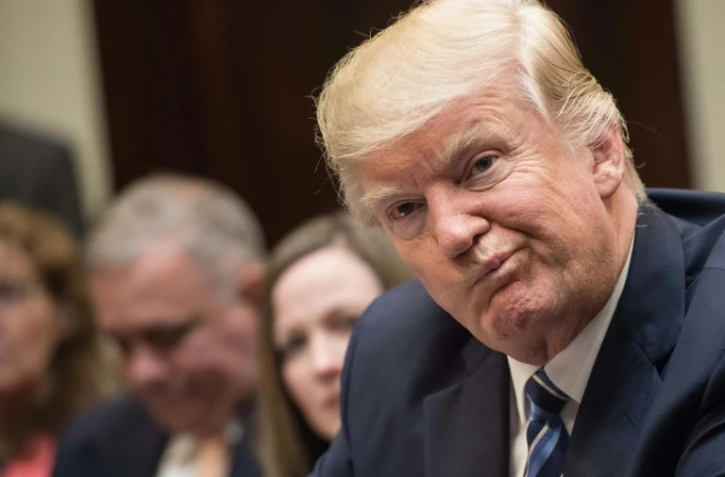 Le président Trump avant une réunion sur sa réforme de la santé, le 13 mars 2017 à Washington