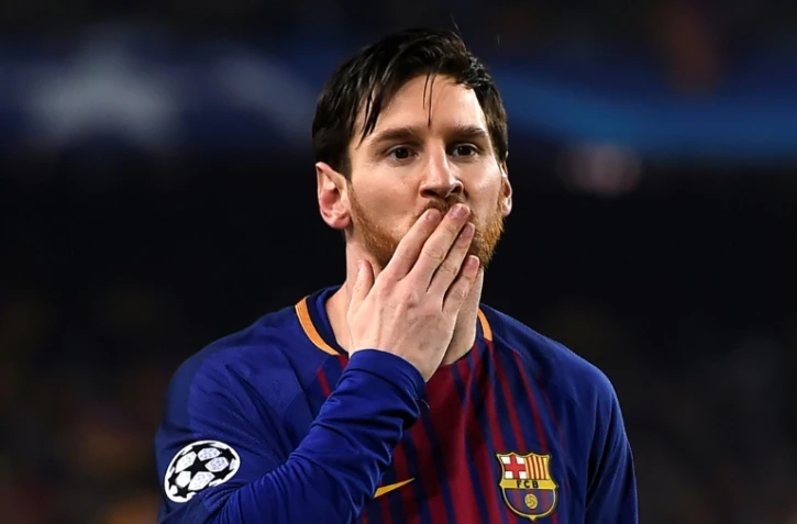Lionel Messi célèbre un but marqué avec le Barça contre Chelsea en Ligue des champions le 14 mars 2018 au Camp Nou de Barcelone