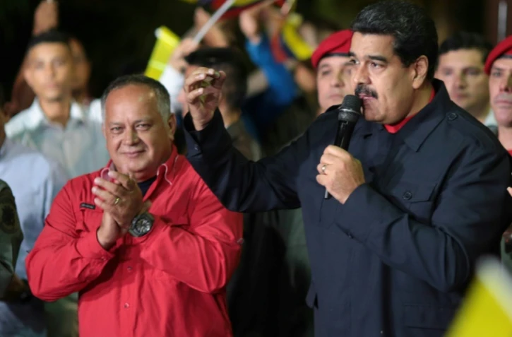 Le président du Venezuela, Nicolas Maduro (d), et l'ancien président de l'Assemblée nationale, Diosdado Cabello (g), à Caracas le 15 octobre 2017