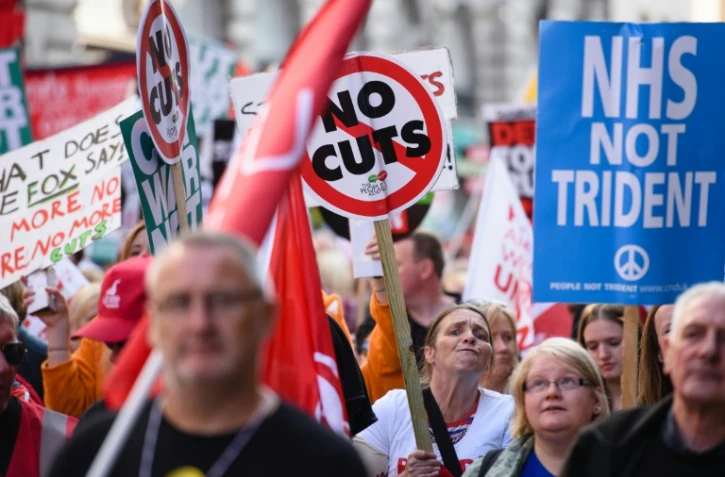 Des manifestants contre l'austérité défilent à Manchester le 4 octobre 2014