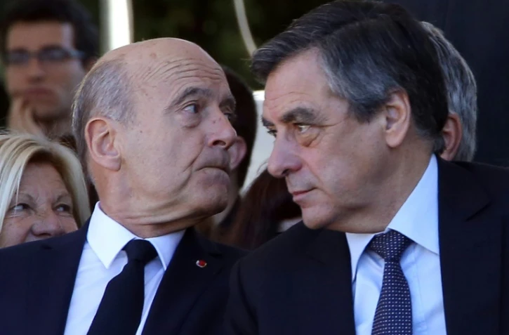 Alain Juppé et François Fillon (D), le 15 octobre 2016 à Nice, lors de l'hommage national aux victimes de l'attentat du 14 juillet