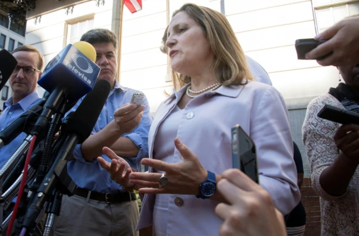 La ministre canadienne des Affaires étrangères, Chrystia Freeland, répond à des journalistes à Washington, le 30 août 2018 