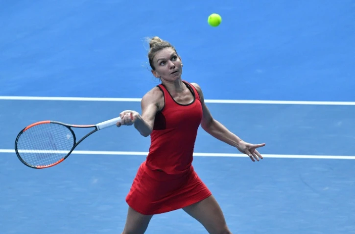 La Roumaine Simona Halep, N.1 mondiale, face à l'Allemande Angelique Kerber en demi-finales de l'Open d'Australie, le 25 janvier 2018 à Melbourne 