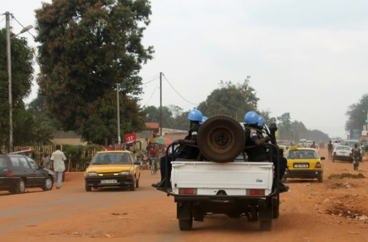 Des casques bleus de la Minusca, l'opération de l'Onu en Centrafrique, dans un véhicule le 15 septembre 2014 à Bangui