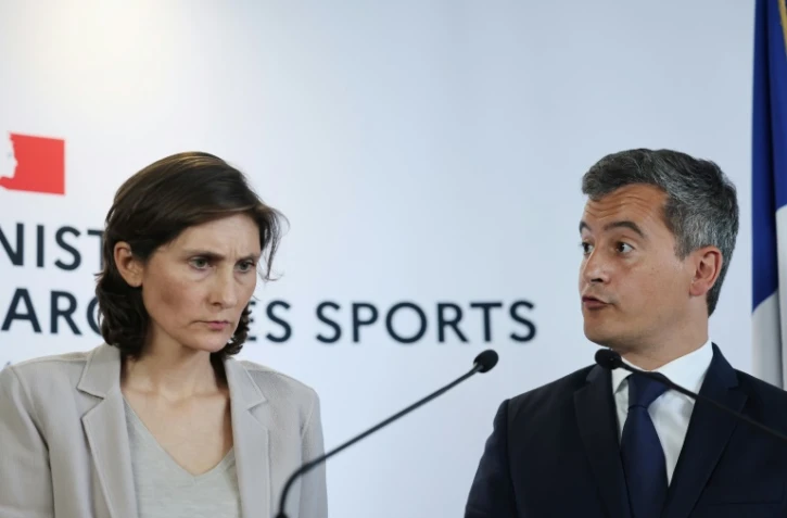 Gérald Darmanin, le ministre de l'Intérieur, et Amélie Oudéa-Castéra, la ministre des Sports, à l'issue de la réunion au ministère des Sports pour cerner les responsabilités des dysfonctionnements lors de la finale d ela Ligue des champions, Paris, le 30 mai 2022