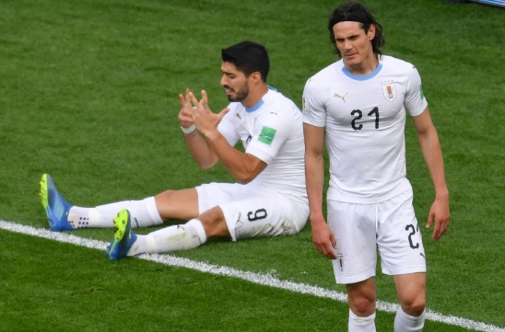 Les attaquants uruguayens Luis Suarez (g) et Edinson Cavani face à l'Egypte au Mondial, le 15 juin 2018 à Ekaterinbourg  