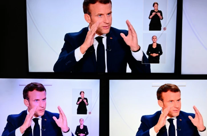 Emmanuel Macron lors d'un entretien télévisé à l'Elysée sur la situation du Covid-19 en France, à Paris le 14 octobre 2020