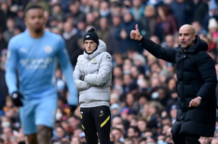 Les entraîneurs Thomas Tuchel (G) et Pep Guardiola (D) lors d'un match de Premier League entre Chelsea et Manchester City, le 15 janvier 2022 à l'Etihad Stadium