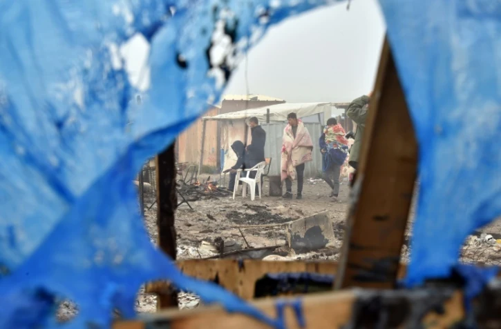 Des migrants dans la "Jungle" de Calais, le 26 octobre 2016