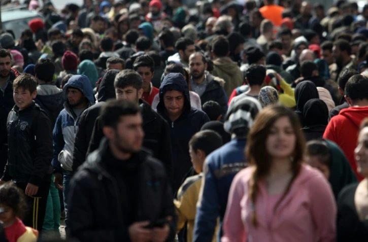 Des migrants aux abords du village de d'Idomeni en Grèce, le 4 mars 2016