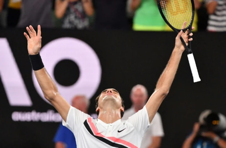Le Suisse Roger Federer après sa victoire face au Croate Marin Cilic en finale de l'Open d'Australie, à Melbourne, le 28 janvier 2018