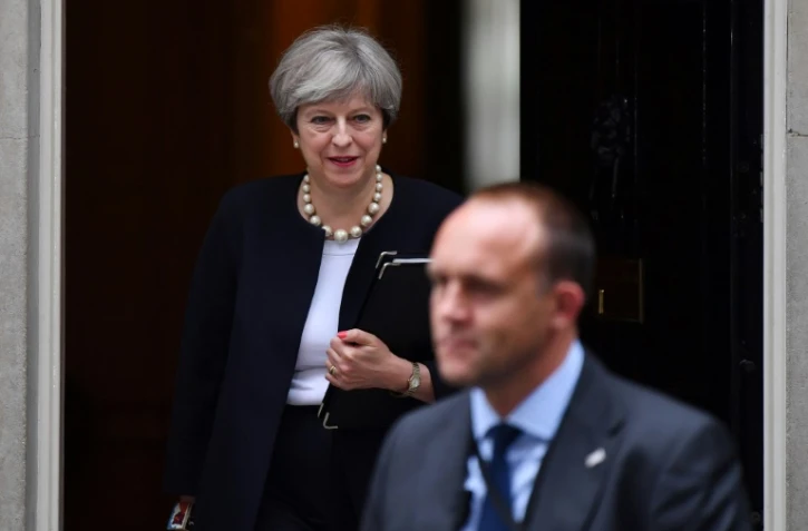 La Première ministre  Theresa May quittant le 10 Downing street, après avoir assisté à la réunion de son gouverment au centre de Londres le meeting 11 juillet 2017