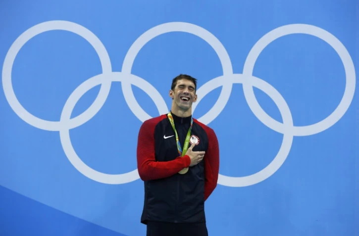 Le nageur américain Michael Phelps sur la plus haute marche du podium du 200 m papillon, le 9 août 2016 à Rio