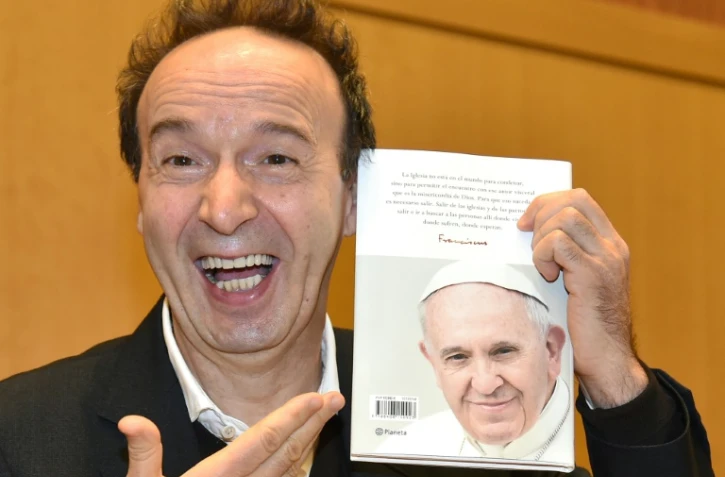 L'acteur et réalisateur Roberto Benigni présente le livre d'entretiens du pape François, "Le nom de Dieu est miséricorde", au Vatican le 12 janvioer 2015