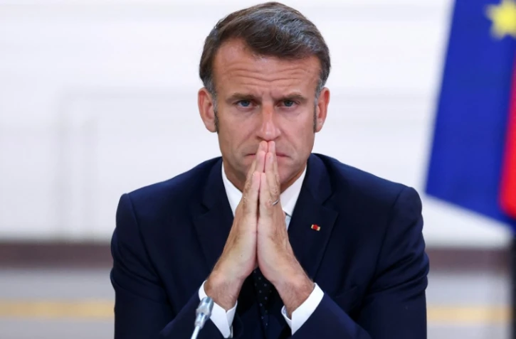 Le président français Emmanuel Macron participe à une réunion au palais de l'Elysée, à Paris, le 12 juillet 2025