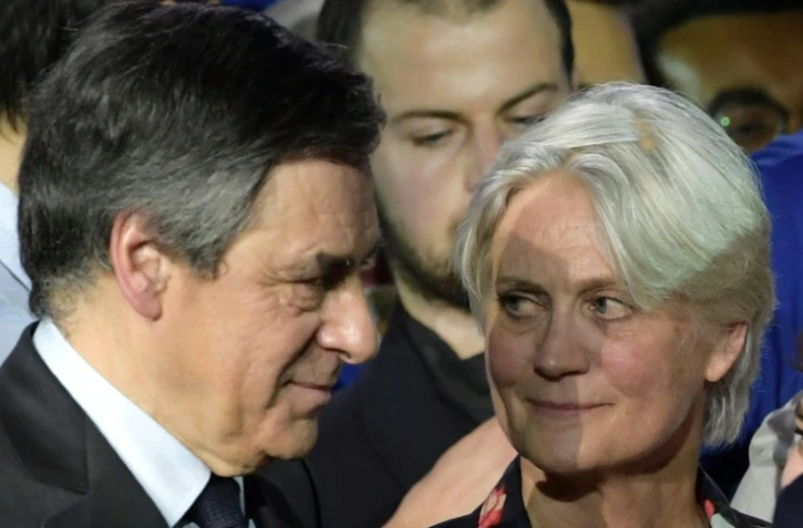 François Fillon (g) et son épouse Penelope Fillon, le 29 janvier 2017 à Paris