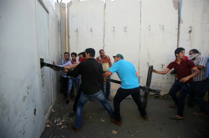 Des partisans du leader chiite Moqtada al-Sadr dans la Zone verte à Bagdad en Irak, le 20 mai 2016