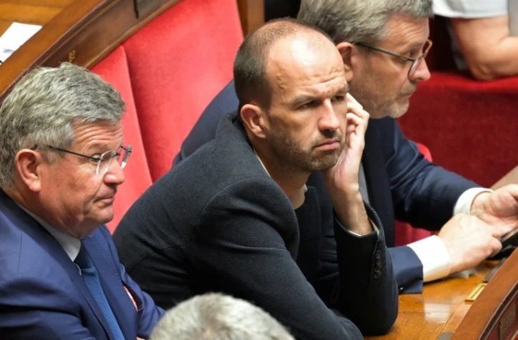 Le député et coordinateur de LFI Manuel Bompard (C) à l'Assemblée nationale le 18 juillet 2024 à Paris