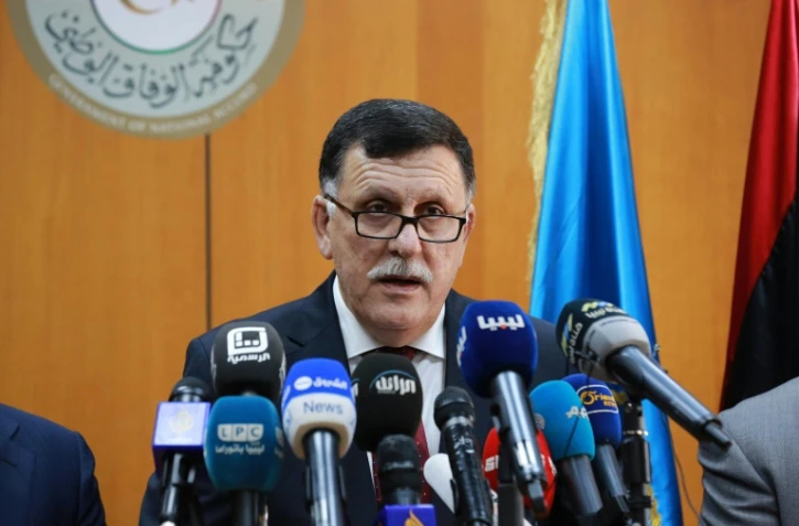 Fayez al-Sarraj, Premier ministre libyen désigné  par la communauté internationale, lors d'une conférence de presse, le 30 mars 2016 à Tripoli