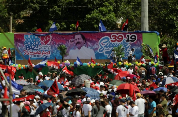 Des soutiens du président Daniel Ortega participe aux commémorations de la révolution sandiniste à Managua, au Nicaragua, le 19 juillet 2018