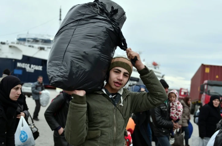 Des migrants à leur arrivée le 10 février 2016 à Lesbos en Grèce