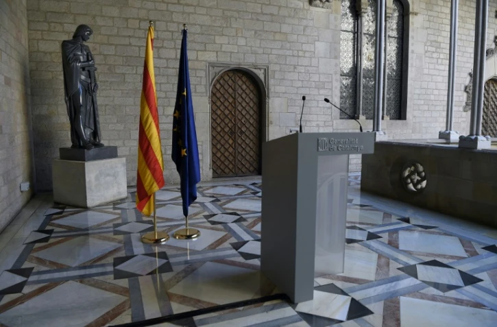 Le lutrin où le président séparatiste catalan Carles Puigdemont devait faire une déclaration institutionnelle au siège du gouvernement régional à Barcelone, le 26 octobre 2017