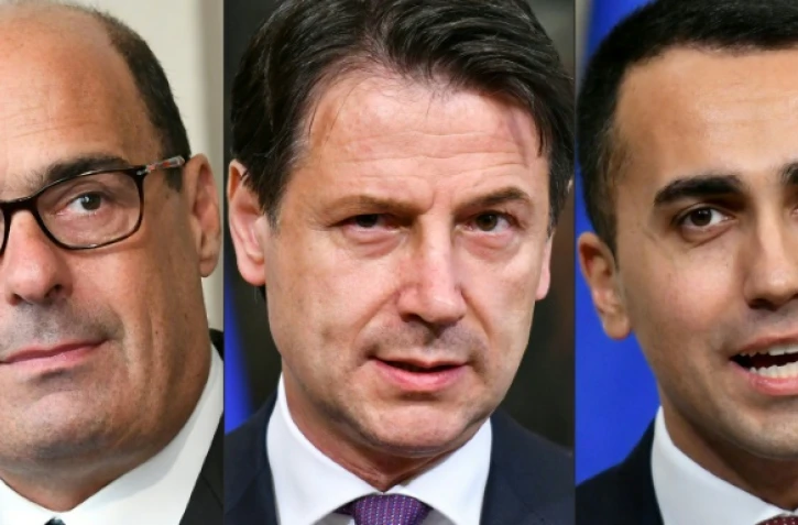 Le président du Parti démocrate Nicola Zingaretti (g), le Premier ministre démissionnaire Giuseppe Conte (c) et le vice-Premier ministre Luigi Di Maio (d)