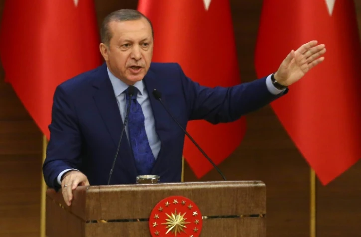 Le président turc Recep Tayyip Erdogan s'exprime devant des élus à Ankara, le 16 mars 2016 