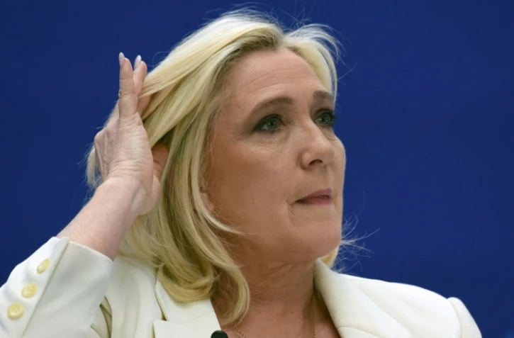 La candidate du RN à la présidentielle Marine Le Pen présente son programme économique le 21 février 2022 à Paris devant des entrepreneurs invités par le Medef