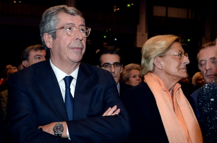 Patrick (G) et Isabelle Balkany (D) le 9 décembre 2015 à Issy-les-Moulineaux en Ile-de-France