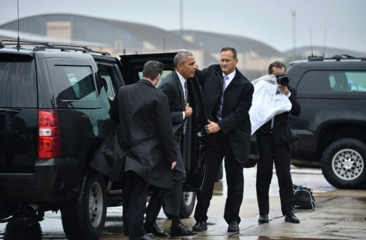 Le président américain Barack Obama arrive sur la base d'Air Force One dans le Maryland, le 29 septembre 2016, d'où il doit décoller pour assister aux obsèques de Shimon Peres à Jérrusalem