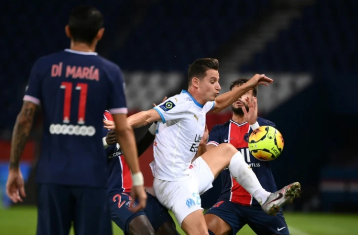L'attaquant de Marseille, Florian Thauvin (c), buteur lors du match de Ligue 1 face au Paris-SG, au  Parc de Princes, le 13 septembre 2020