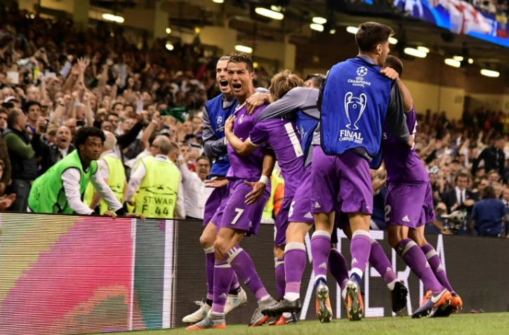 Les joueurs du Real Madrid autour de Cristiano Ronaldo, double buteur contre la Juventus à Cardiff, le 3 juin 2017