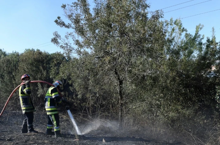 Opération de "noyage" des braises le 11 août 2016 à Les Pennes Mirabeau près de Marseille